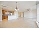 Open concept dining room with kitchen access at 130 Riviera Dunes Way # 306, Palmetto, FL 34221