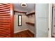 Large walk-in closet with ample shelving and hanging space at 235 Cocoanut Ave # 113C, Sarasota, FL 34236