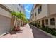 Attractive brick-paved driveway leading to a row of townhouses at 235 Cocoanut Ave # 113C, Sarasota, FL 34236