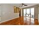 Bright bedroom featuring hardwood floors and large windows at 235 Cocoanut Ave # 113C, Sarasota, FL 34236