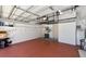 Spacious garage with overhead storage and room for two cars at 235 Cocoanut Ave # 113C, Sarasota, FL 34236