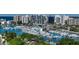Aerial view of marina, waterfront homes, and city at 235 Cocoanut Ave # 113C, Sarasota, FL 34236