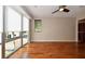 Spacious bedroom with hardwood floors and city views at 235 Cocoanut Ave # 113C, Sarasota, FL 34236