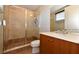 Bathroom with walk-in shower and updated fixtures at 235 Cocoanut Ave # 113C, Sarasota, FL 34236
