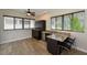 Modern kitchen with dark cabinets and granite countertops at 235 Cocoanut Ave # 113C, Sarasota, FL 34236