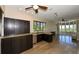Modern kitchen with dark cabinets and granite countertops at 235 Cocoanut Ave # 113C, Sarasota, FL 34236