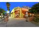 Cafe Epicure, inviting outdoor seating at night at 235 Cocoanut Ave # 113C, Sarasota, FL 34236