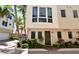Townhouse with front door and parking area at 235 Cocoanut Ave # 113C, Sarasota, FL 34236