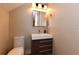 Modern bathroom with updated vanity and toilet at 235 Cocoanut Ave # 113C, Sarasota, FL 34236