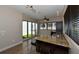 Modern kitchen with granite countertop and bar seating at 235 Cocoanut Ave # 113C, Sarasota, FL 34236