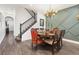 Modern dining room with a round table, ornate chairs, and a stylish chandelier at 274 Cape Harbour Loop # 103, Bradenton, FL 34212