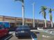 Parking lot view of a shopping center at 1837 Flamingo Blvd # O35, Bradenton, FL 34207