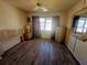 Bedroom with double bed, dresser and large window at 1837 Flamingo Blvd # O35, Bradenton, FL 34207
