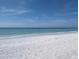 Expansive beach with white sand and clear water at 1837 Flamingo Blvd # O35, Bradenton, FL 34207