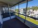 Relaxing screened balcony overlooking lush green space at 1837 Flamingo Blvd # O35, Bradenton, FL 34207