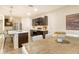 Open concept dining area with wooden table and chairs, adjacent to the kitchen at 15436 Trinity Fall Way, Bradenton, FL 34212