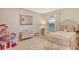 bedroom with a twin bed and playful decor at 15436 Trinity Fall Way, Bradenton, FL 34212