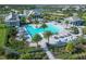 Resort-style pool with expansive sundeck and multiple seating areas at 8175 Redonda Loop, Lakewood Ranch, FL 34202