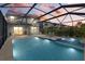 Stunning pool and spa at dusk, under the setting sun at 16232 Pine Mist Dr, Bradenton, FL 34211