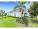 White two-story house with landscaping at 16518 Cornwall Ln, Bradenton, FL 34202