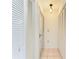 Interior hallway with built-in storage and access to other rooms at 2220 Orange Blossom Ln, Bradenton, FL 34207