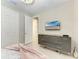 Bedroom with a dresser and a mounted TV at 4133 Golden Creek Ter, Parrish, FL 34219