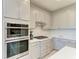 Modern kitchen features with stainless steel appliances and marble backsplash at 4133 Golden Creek Ter, Parrish, FL 34219