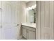 Modern bathroom with gray vanity and a shower at 4133 Golden Creek Ter, Parrish, FL 34219