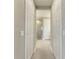 Clean hallway leading to the bathroom and bedrooms at 4133 Golden Creek Ter, Parrish, FL 34219