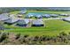 Luxury homes community with lake and lush green spaces at 4133 Golden Creek Ter, Parrish, FL 34219