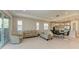 Open concept kitchen and dining area with modern cabinetry and a large island at 4133 Golden Creek Ter, Parrish, FL 34219