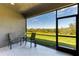 Spacious screened patio overlooking backyard at 4133 Golden Creek Ter, Parrish, FL 34219