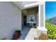 Welcoming front entry with seating area at 4133 Golden Creek Ter, Parrish, FL 34219