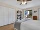 Main bedroom with king-size bed and access to private patio at 6417 Meadowlark Ln # 6417, Bradenton, FL 34210
