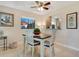 Cozy dining area with a wooden table and four chairs at 6417 Meadowlark Ln # 6417, Bradenton, FL 34210