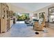 Spacious living room with comfortable seating and large windows at 6417 Meadowlark Ln # 6417, Bradenton, FL 34210