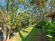 Lush landscaping and serene canal views from the property at 6417 Meadowlark Ln # 6417, Bradenton, FL 34210
