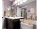 Guest bathroom with double vanity and updated fixtures at 4966 Clubview E Ct, Bradenton, FL 34203