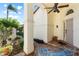 Welcoming front entryway with arched details and brick flooring at 4966 Clubview E Ct, Bradenton, FL 34203