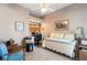 Bedroom with built-in workspace and daybed at 4966 Clubview E Ct, Bradenton, FL 34203