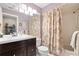 Guest bathroom with a shower/tub combo and vanity at 4966 Clubview E Ct, Bradenton, FL 34203