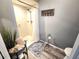 Bathroom with shower, toilet and gray walls at 7201 29Th Avenue W Dr # 308, Bradenton, FL 34209