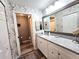 Bathroom with double vanity and granite countertop at 7201 29Th Avenue W Dr # 308, Bradenton, FL 34209