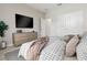 Bedroom with a bed, dresser and neutral decor at 3371 Gowanda Ave, North Port, FL 34287