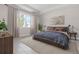 Spacious bedroom with a large bed and neutral decor at 3371 Gowanda Ave, North Port, FL 34287