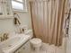 Bathroom with tub shower and vanity at 2607 Riverbluff Pkwy # V145, Sarasota, FL 34231