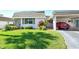 Updated single story home with carport and neatly kept lawn at 2607 Riverbluff Pkwy # V145, Sarasota, FL 34231