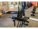 Fitness center with weight bench and dumbbell rack at 611 Riviera Dunes Way # 104, Palmetto, FL 34221