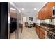 Modern kitchen with stainless steel appliances and granite countertops at 611 Riviera Dunes Way # 104, Palmetto, FL 34221