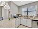 Modern kitchen with stainless steel appliances and granite countertops at 228 Crew Ct, Sarasota, FL 34243